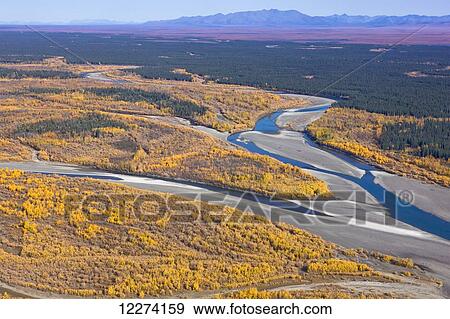 Stock Photo - Aerial of the Noatak River, Igichuk Hills and the Baird Mountains in the distance, Noatak, Arctic Alaska, USA, Fall. Fotosearch