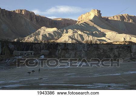 Stock Photograph - Afghan Farmers And Their Donkeys Leaving A Gristmill By Band-I-Haibat (Dam Of Awe), Band-I-Amir, Bamian Province, Afghanistan. Fotosearch