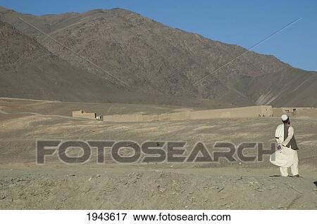 Stock Photo - Afghan Man Looking At The Mountains Near Jalrez, Vardak Province, Afghanistan. Fotosearch