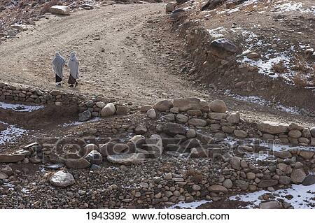 Afghan Women On A Road Near Kalu, Bamian Province, Afghanistan View Large Photo Image Stock Image - Afghan Women On A Road Near Kalu, Bamian Province, Afghanistan. Fotosearch