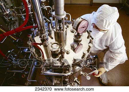 Agriculture - A technician at an agricultural laboratory operating a bioreactor used for producing viruses for vaccine production. View Large Photo Image Stock Image - Agriculture - A technician at an agricultural laboratory operating a bioreactor used for producing viruses for vaccine production.. Fotosearch