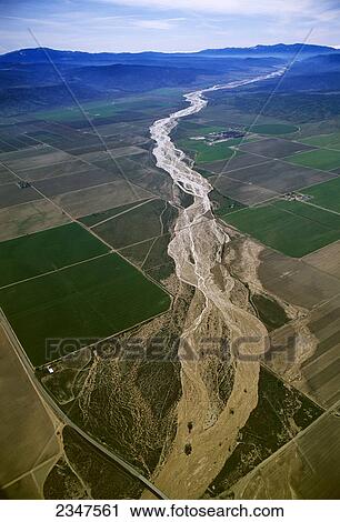 Agriculture - Aerial view of cultivated and fallow agricultural fields with a nearly dry river passing through / Cayama Valley, Santa Barbara County, California, USA. View Large Photo Image Stock Image - Agriculture - Aerial view of cultivated and fallow agricultural fields with a nearly dry river passing through / Cayama Valley, Santa Barbara County, California, USA.. Fotosearch