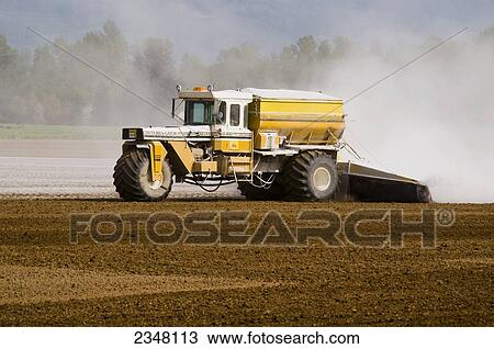 Agriculture - Application of lime by a TerraGator to a field prepared for planting potatoes / Skagit County, Washington, USA. View Large Photo Image Stock Image - Agriculture - Application of lime by a TerraGator to a field prepared for planting potatoes / Skagit County, Washington, USA.. Fotosearch