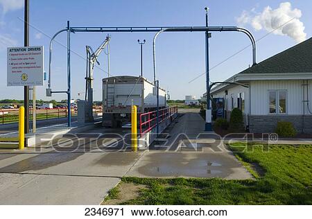 Agriculture - Ethanol production plant. Grain corn trucks being weighed and quality samples taken by mechanical probe / Iowa, USA. View Large Photo Image Stock Image - Agriculture - Ethanol production plant. Grain corn trucks being weighed and quality samples taken by mechanical probe / Iowa, USA.. Fotosearch