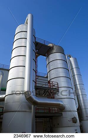 Agriculture - Ethanol production plant. Superstructure and piping. Distillation columns / Iowa, USA. View Large Photo Image Stock Photo - Agriculture - Ethanol production plant. Superstructure and piping. Distillation columns / Iowa, USA.. Fotosearch