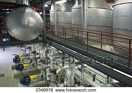 Stock Photo - Agriculture - Ethanol production plant. Cooking units / Iowa, USA.. Fotosearch