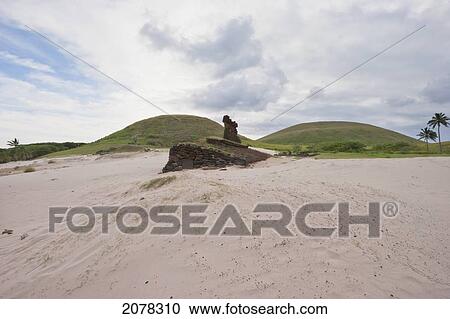 Stock Image - Ahu Nau Nau Moais Restored By The Archaeologist Sergio Rapu At Anakena Beach, Rapa Nui (Easter Island), Chile. Fotosearch