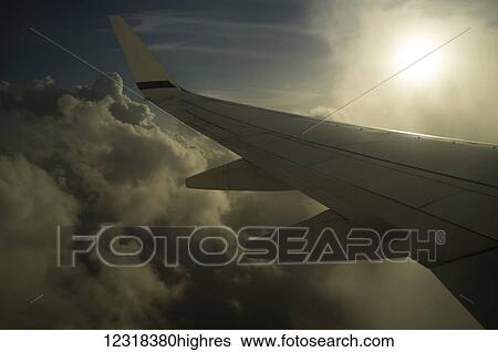 Stock Photograph - Alaska Airlines 737 wing while enroute from Anchorage to Honolulu; United States of America. Fotosearch