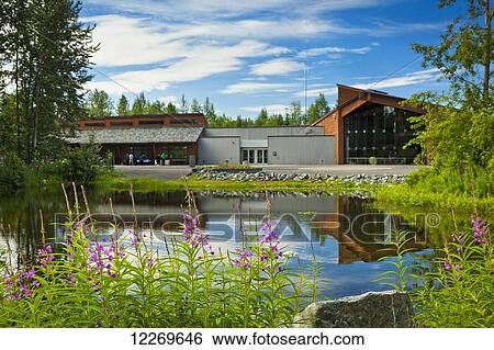 Alaskan Native Heritage Center building reflects on Lake Tiulana, Anchorage, Southcentral Alaska, Summer. None View Large Photo Image Stock Photograph - Alaskan Native Heritage Center building reflects on Lake Tiulana, Anchorage, Southcentral Alaska, Summer. None. Fotosearch