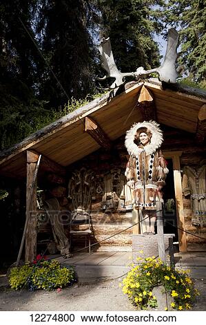 Alaskan Native Indian guide modeling a fur coat outside a cabin at an Athabascan village on the Riverboat Discovery Tour, Fairbanks, Interior Alaska, Summer View Large Photo Image Stock Image - Alaskan Native Indian guide modeling a fur coat outside a cabin at an Athabascan village on the Riverboat Discovery Tour, Fairbanks, Interior Alaska, Summer. Fotosearch