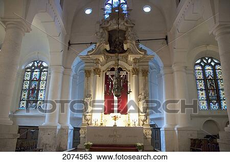 Stock Image - Altar With Sculptures Of The Crucified Saviour, St. Peter & St. Paul Carved In Wood By J. E. Meier & K. E. Apfelbaum At The St. John's Church, Riga, Latvia. Fotosearch