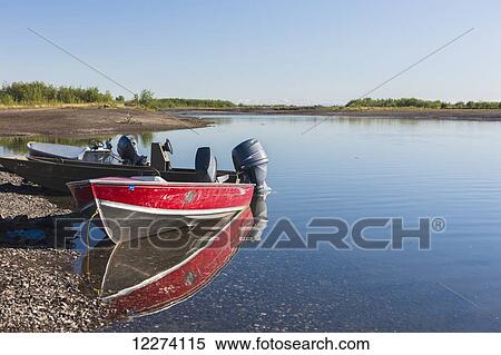 Aluminum boats float near the shore of the Noatak River, Noatak, Arctic Alaska, USA, Summer View Large Photo Image Stock Photography - Aluminum boats float near the shore of the Noatak River, Noatak, Arctic Alaska, USA, Summer. Fotosearch