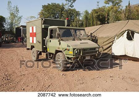 Stock Image - Ambulance Of Canada's Dart (Disaster Assistance Response Team) By The Field Hospital After The 8 October 2005 Earthquake, Garhi Dopatta, Azad Jammu & Kashmir, Pakistan. Fotosearch