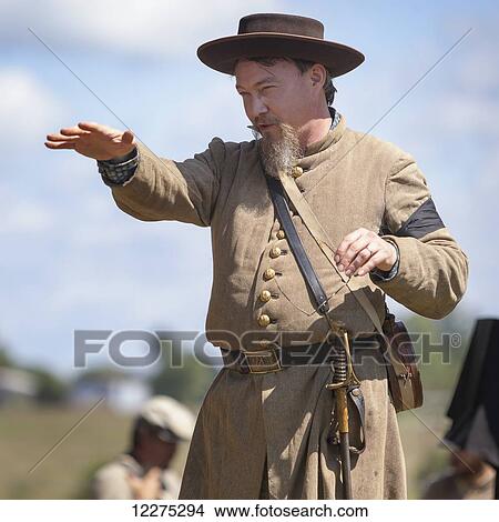 Picture - American Civil War confederate re-enactor speaking to a group of people; Munfordville, Kentucky, United States of America. Fotosearch
