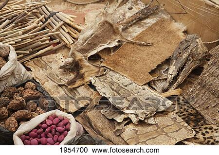 Stock Image - Amulets for sale at the market in Segou, Mali. Fotosearch
