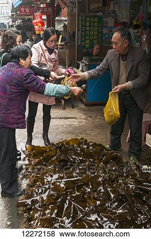 Stock Photo - An algae shop at the Bashi market; Xiamen, Fujian province, China. Fotosearch