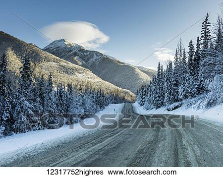 An icy road through the Northern Rockies; British Columbia, Canada View Large Photo Image Stock Photograph - An icy road through the Northern Rockies; British Columbia, Canada. Fotosearch