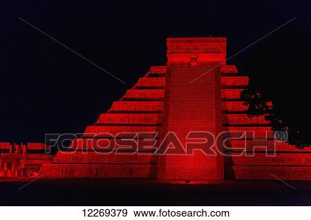 Ancient Mayan Pyramid at night illuminated with red light; Chichen Itza, Yucatan, Mexico View Large Photo Image Stock Photo - Ancient Mayan Pyramid at night illuminated with red light; Chichen Itza, Yucatan, Mexico. Fotosearch
