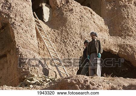 Stock Image - Archaeological Teams Working On The Restoration Of The Cliffs At Bamiyan, Bamian Province, Afghanistan. Fotosearch