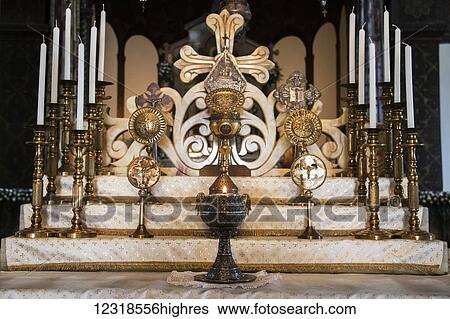 Stock Photograph - Armenian cross and candle holders on the main altar of Etchmiadzin Cathedral; Vagharshapat, Armavir Province, Armenia. Fotosearch