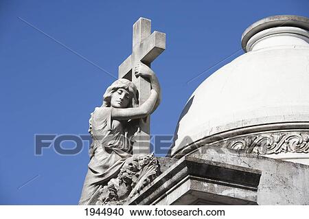 Stock Image - Art Nouveau Sculpture Atop A Mausoleum At The Cementerio De La Recoleta, Buenos Aires, Capital Federal, Argentina. Fotosearch