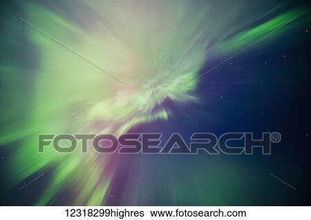Stock Photograph - Aurora borealis corona display over Turnagain Arm; Alaska, United States of America. Fotosearch