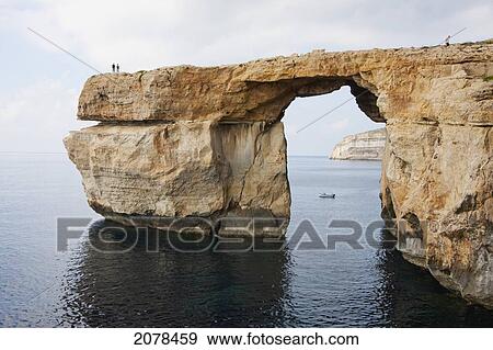 Azure Window, A Natural Rock Arch, Dwejra Bay, Gozo Island, Malta View Large Photo Image Stock Photo - Azure Window, A Natural Rock Arch, Dwejra Bay, Gozo Island, Malta. Fotosearch