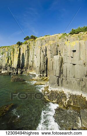 Basalt rock cliffs, Brier Island, Bay of Fundy; Nova Scotia, Canada View Large Photo Image Stock Photograph - Basalt rock cliffs, Brier Island, Bay of Fundy; Nova Scotia, Canada. Fotosearch