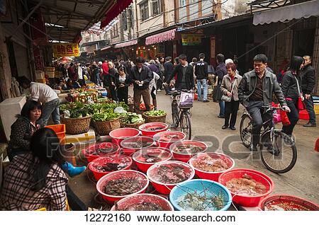 Stock Image - Bashi market, eighth market, a traditional Chinese market where we can find all different kinds of food; Xiamen, Fujian Province, China. Fotosearch