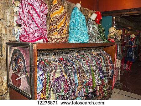 Batik shirts on display at Saptohoedojo Art Gallery, Yogyakarta, Java Island, Indonesia View Large Photo Image Stock Image - Batik shirts on display at Saptohoedojo Art Gallery, Yogyakarta, Java Island, Indonesia. Fotosearch