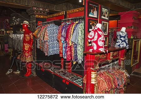 Stock Image - Batik shirts on display at Saptohoedojo Art Gallery, Yogyakarta, Java Island, Indonesia. Fotosearch