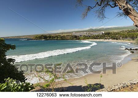 Stock Image - Beach in front of Mauna Kea Beach Hotel; Island of Hawaii, Hawaii, United States of America. Fotosearch