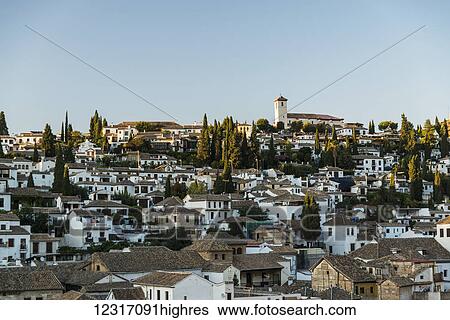 Stock Photograph - Beautiful sunset in Albaicin neighborhood; Granada, Andalucia, Spain. Fotosearch