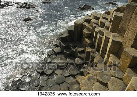 Black Basalt Columns Sticking Out Of The Sea, Giant's Causeway, Northern Ireland, United Kingdom View Large Photo Image Stock Photograph - Black Basalt Columns Sticking Out Of The Sea, Giant's Causeway, Northern Ireland, United Kingdom. Fotosearch