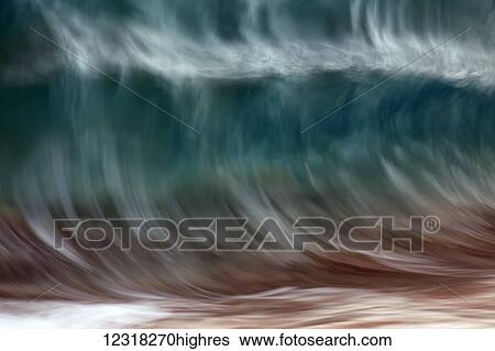 Stock Photograph - Blur of the motion of a wave; Hawaii, United States of America. Fotosearch