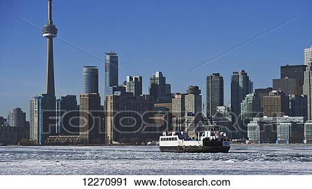Boat against city skyline from Ward's Island in winter; Toronto, Ontario, Canada View Large Photo Image Stock Image - Boat against city skyline from Ward's Island in winter; Toronto, Ontario, Canada. Fotosearch