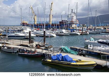 Picture - Boats and a large ship docked in the harbour; Fenit, County Kerry, Ireland. Fotosearch