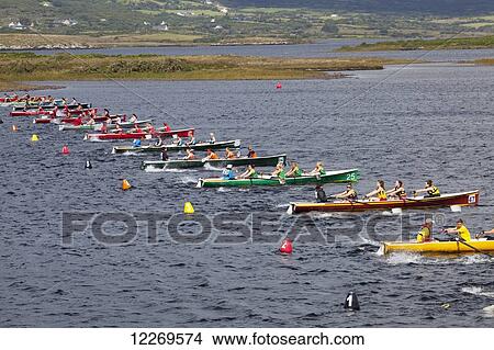 Picture - Boats lined up for the All Ireland Rowing Championships; Waterville, County Kerry, Ireland . Fotosearch