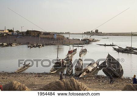 Boats on the Niger River in Mopti, Mali View Large Photo Image Picture - Boats on the Niger River in Mopti, Mali. Fotosearch