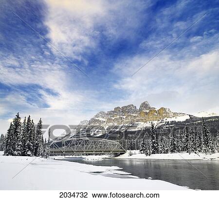 Bow River And Castle Mountain With Castle Mountain Bridge In Winter, Banff National Park, Alberta View Large Photo Image Stock Image - Bow River And Castle Mountain With Castle Mountain Bridge In Winter, Banff National Park, Alberta. Fotosearch