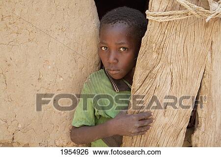 Boy in a Dogon home in Neni, Mali View Large Photo Image Stock Photograph - Boy in a Dogon home in Neni, Mali. Fotosearch