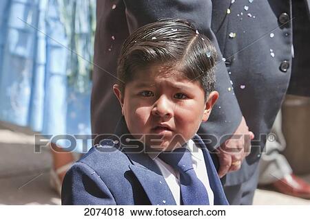 Stock Photo - Boy In The Procession Of The Poderosa Morenada Promesantes Del Ni. Fotosearch