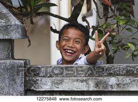 Boy, Semparu, Lombok, West Nusa Tenggara, Indonesia View Large Photo Image Stock Photo - Boy, Semparu, Lombok, West Nusa Tenggara, Indonesia. Fotosearch