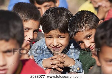Boys Attending A Class In The Grounds Of A School In Destroyed By The 8 October 2005 Earthquake, Chakothi, Azad Kashmir, Pakistan View Large Photo Image Stock Photo - Boys Attending A Class In The Grounds Of A School In Destroyed By The 8 October 2005 Earthquake, Chakothi, Azad Kashmir, Pakistan. Fotosearch