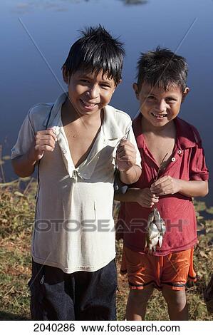 Boys By A Lagoon Near Carmen Ruiz, Santa Cruz Department, Bolivia View Large Photo Image Stock Photograph - Boys By A Lagoon Near Carmen Ruiz, Santa Cruz Department, Bolivia. Fotosearch