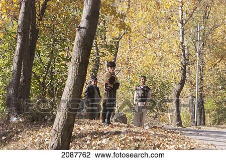 Stock Image - Boys By The Road After The 8 October 2005 Earthquake, Sudhangali, Azad Kashmir, Pakistan. Fotosearch