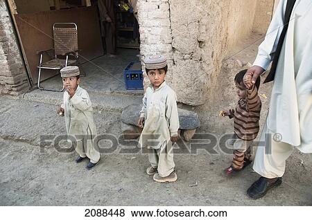 Stock Photo - Boys In The Khyber Pass, Federally Administered Tribal Areas, Pakistan. Fotosearch