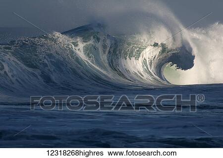 Stock Photograph - Breaking wave; Hawaii, United States of America. Fotosearch