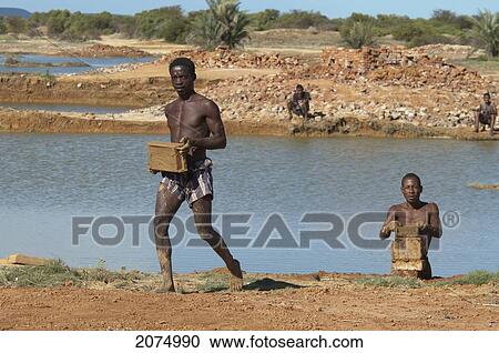Brick Makers, Antsokay, Toliara Province, Madagascar View Large Photo Image Stock Image - Brick Makers, Antsokay, Toliara Province, Madagascar. Fotosearch