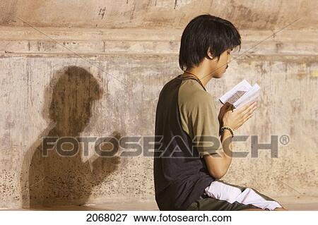 Stock Photo - Buddhist Man Meditating, Mahabodi Temple, Bodhgaya, Bihar, India. Fotosearch